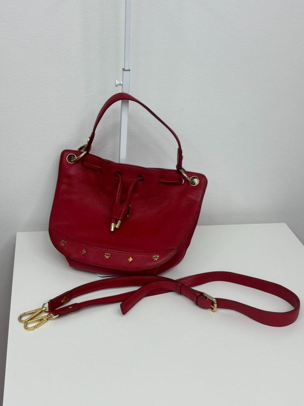MCM Red Pebbled Leather Gold Studded Drawstring Bucket Shoulder Bag